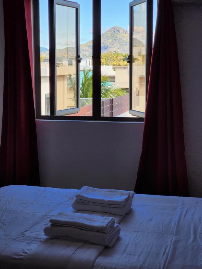Sunsetview Beach Apartment Flic en Flac Bagian luar foto