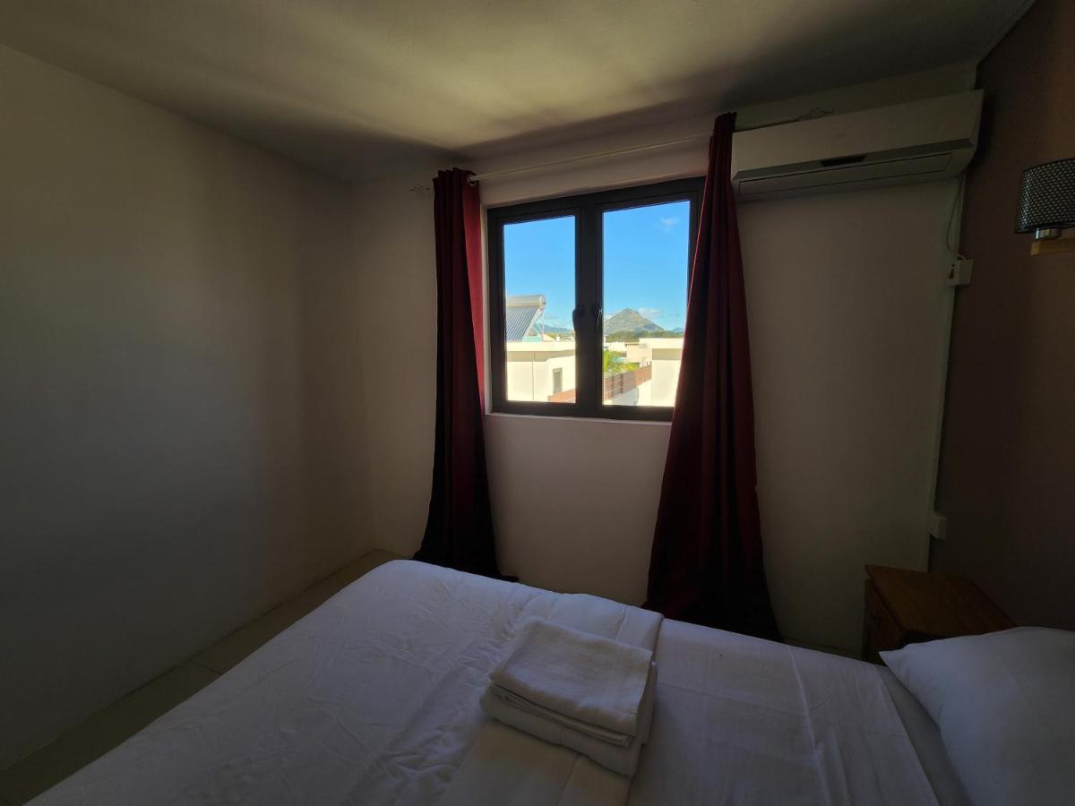 Sunsetview Beach Apartment Flic en Flac Bagian luar foto